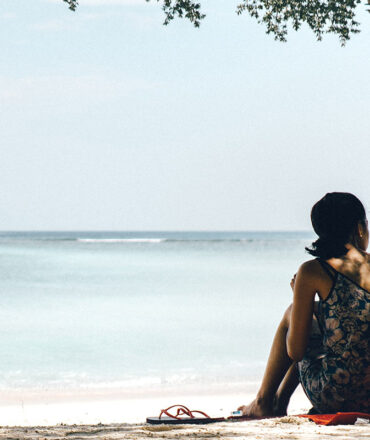 Girl on a lonely beach